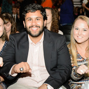 Students showing their rings at event