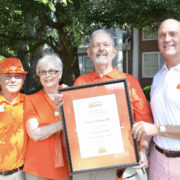 Frank Inabnit receives an honorary alumnus plaque from Clemson President James P. Clements