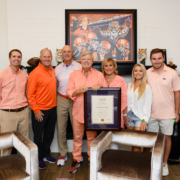 Charlie Barker and Clemson Leadership as he is presented the designation of Honorary Alumnus