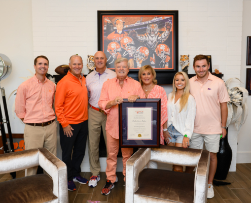Charlie Barker and Clemson Leadership as he is presented the designation of Honorary Alumnus