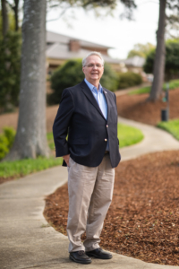 Boyd Parr standing by a tree