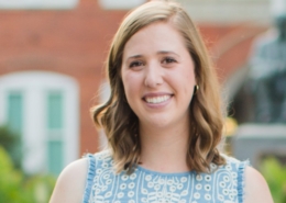 Katie Britton standing in front of Tillman Hall