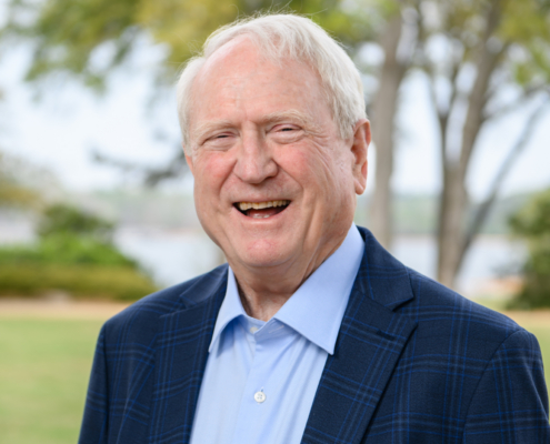 Jim Hendrix standing in a field