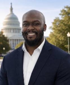 Joshua Smith smiling in front of the capital