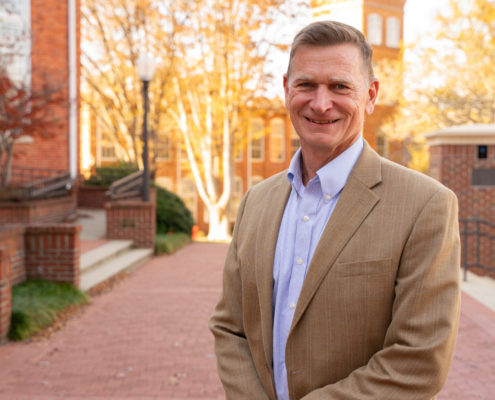 Joe Ryan posing on campus