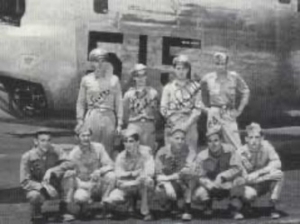 Second Lieutenant Barksdale, standing second from right, and the Rough Buddy crew.